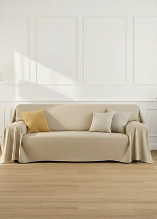 ARMOR beige vandtæt sofaovertræk i stof; sofaen er dækket.