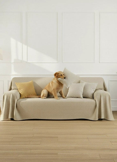 ARMOR telo beige waterproof sofa slipcover on a sofa with cushions
